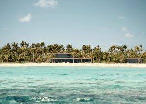 Aerial view of the Patina Maldives Sunset Water Villa