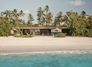 Aerial shot of the front of the Patina Maldives Sunset Beach Villa
